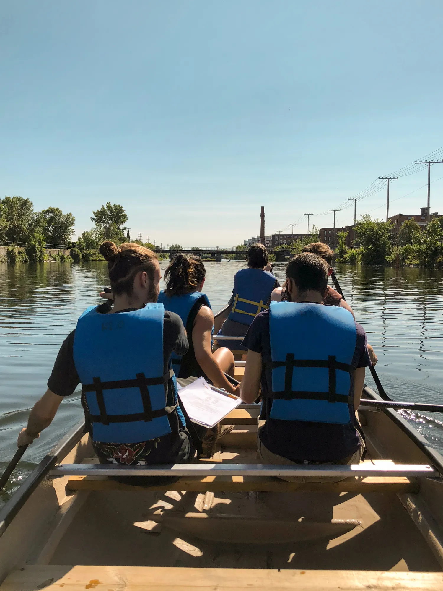 Photo of employees canoeing on the Lachine Canal